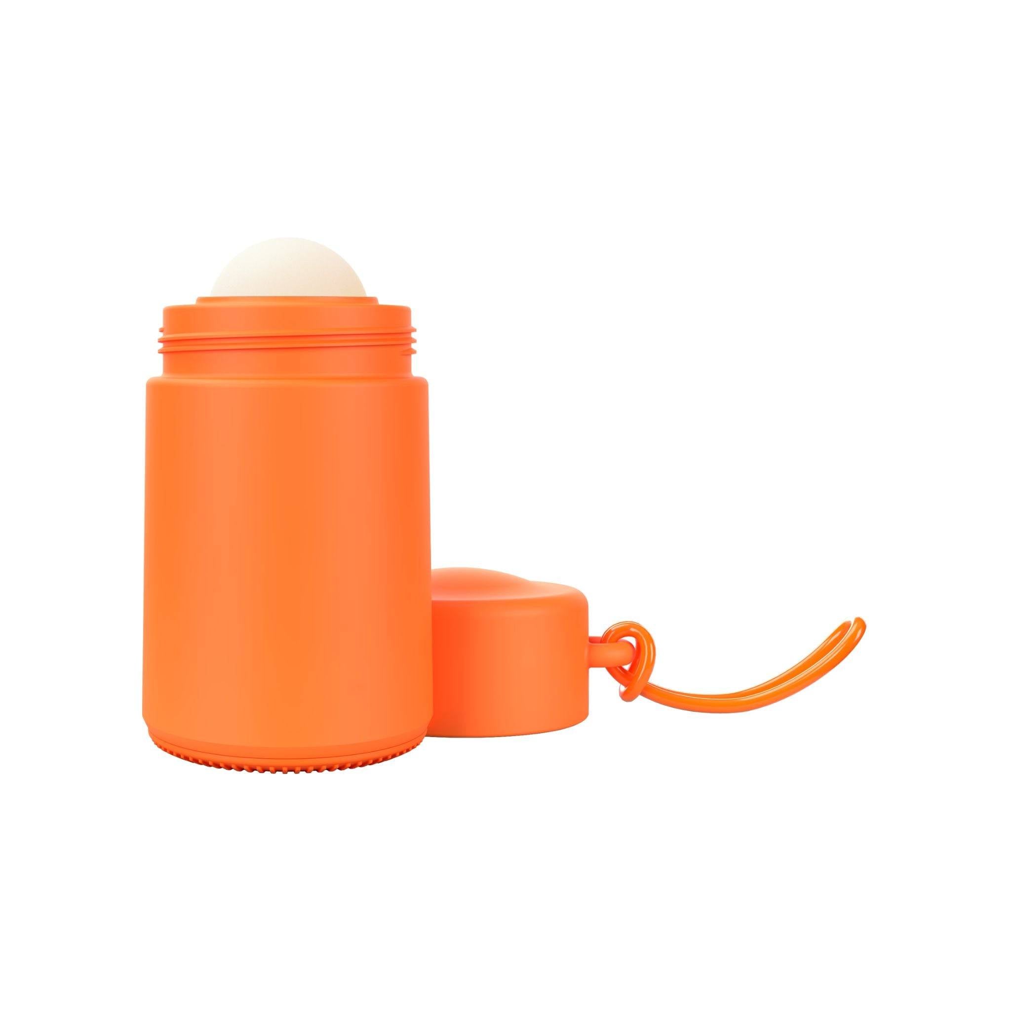 Orange refillable roll-on travel applicator with lid to side