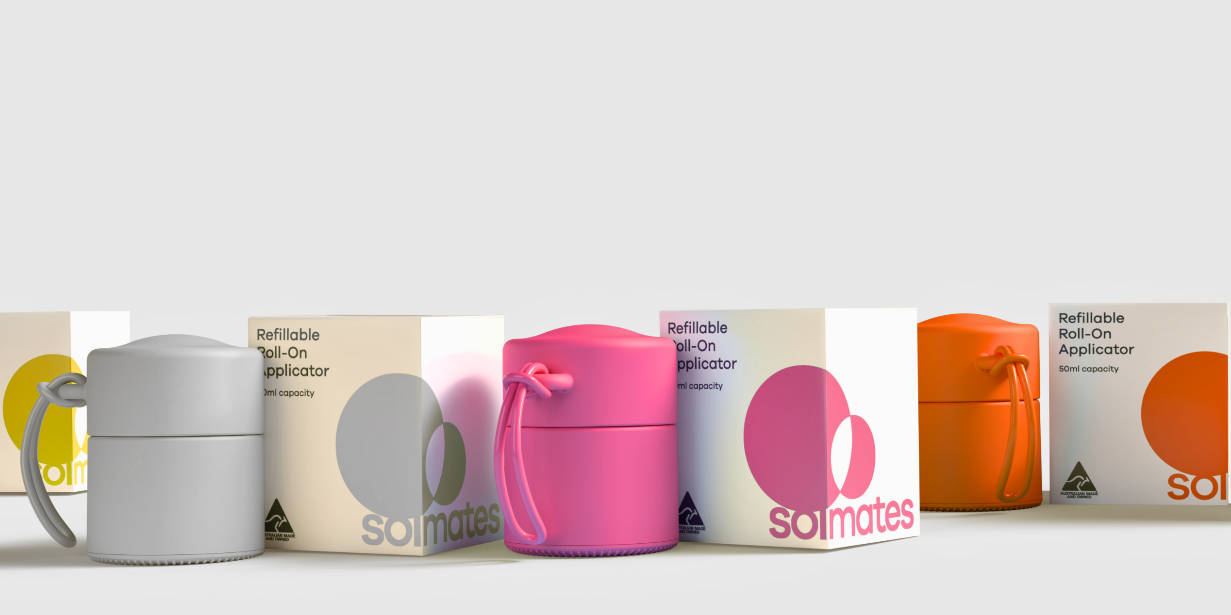 Collection of colorful containers with 'somates' branding on a white background