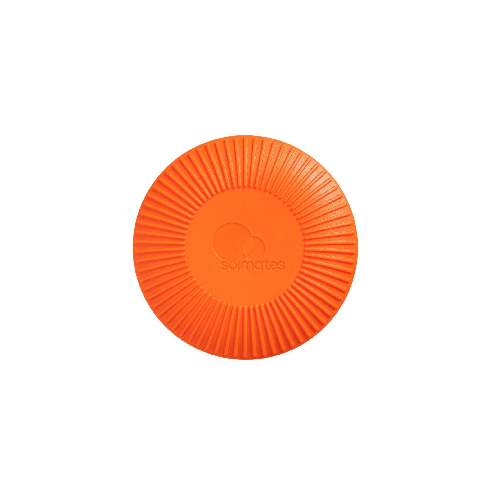 Base of orange refillable roll-on travel applicator